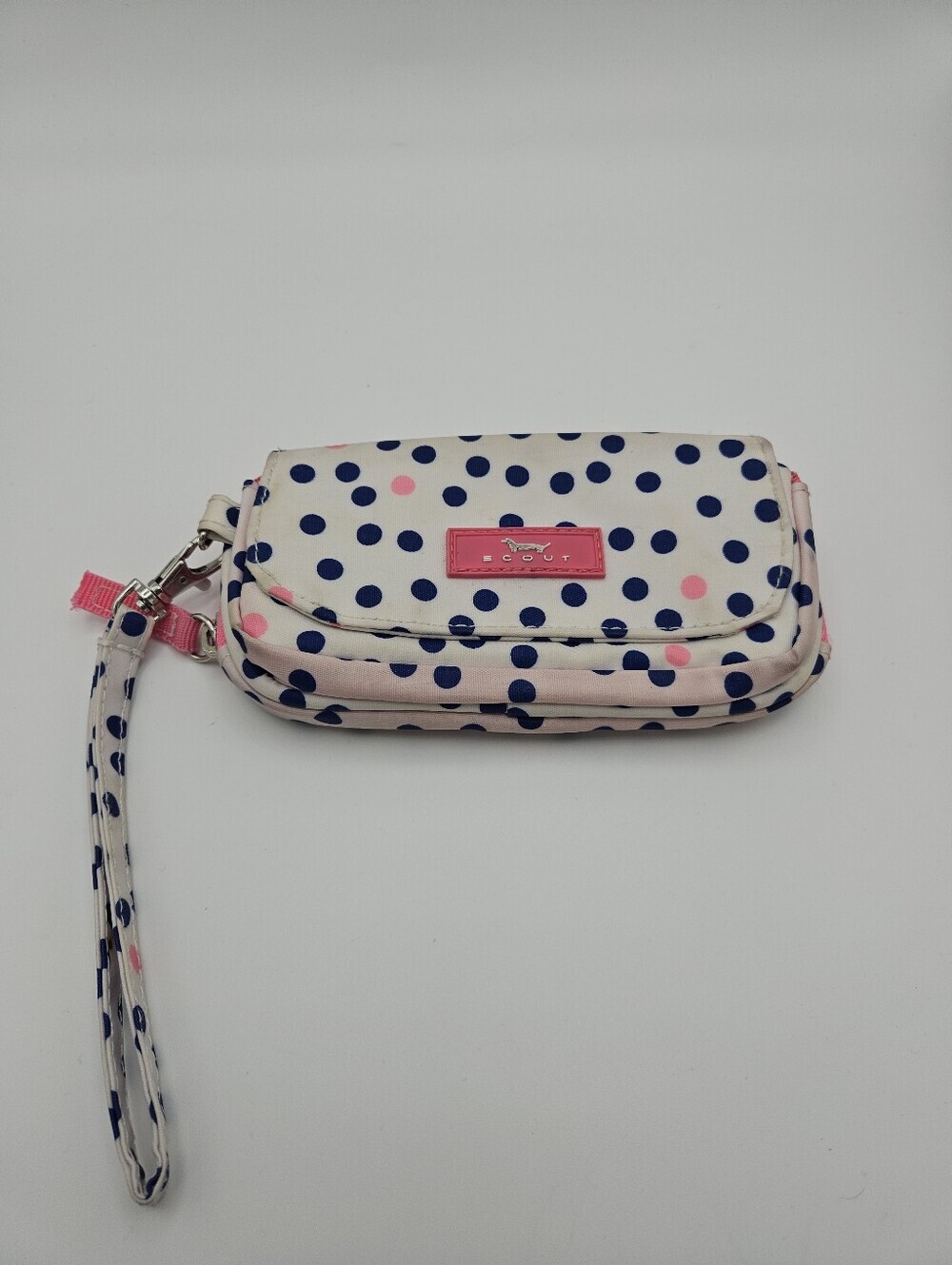 Scout white wristlet with blue polka dots and pin accents